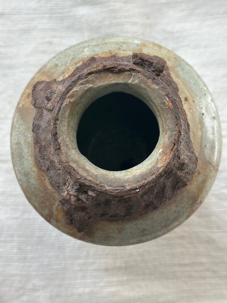 "one of a kind" ceramic vase with tarnished metal detail